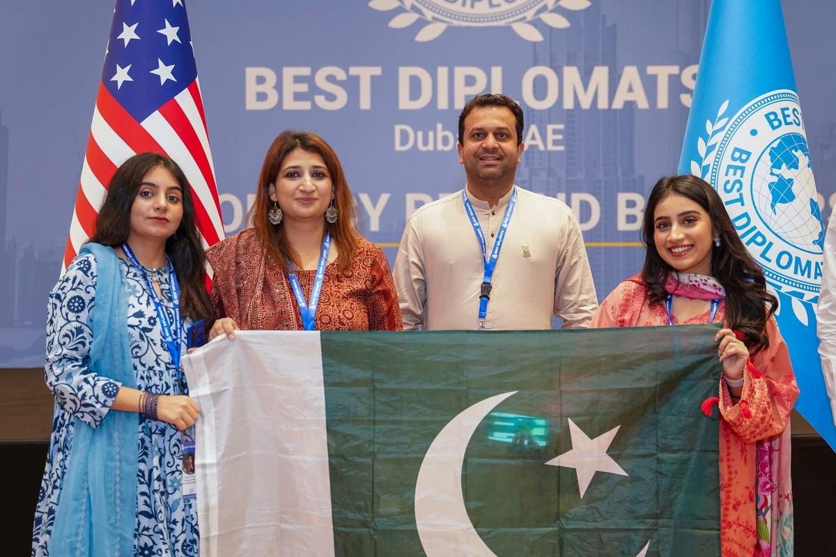 Pakistani delegation with national flag at Best Diplomats Dubai